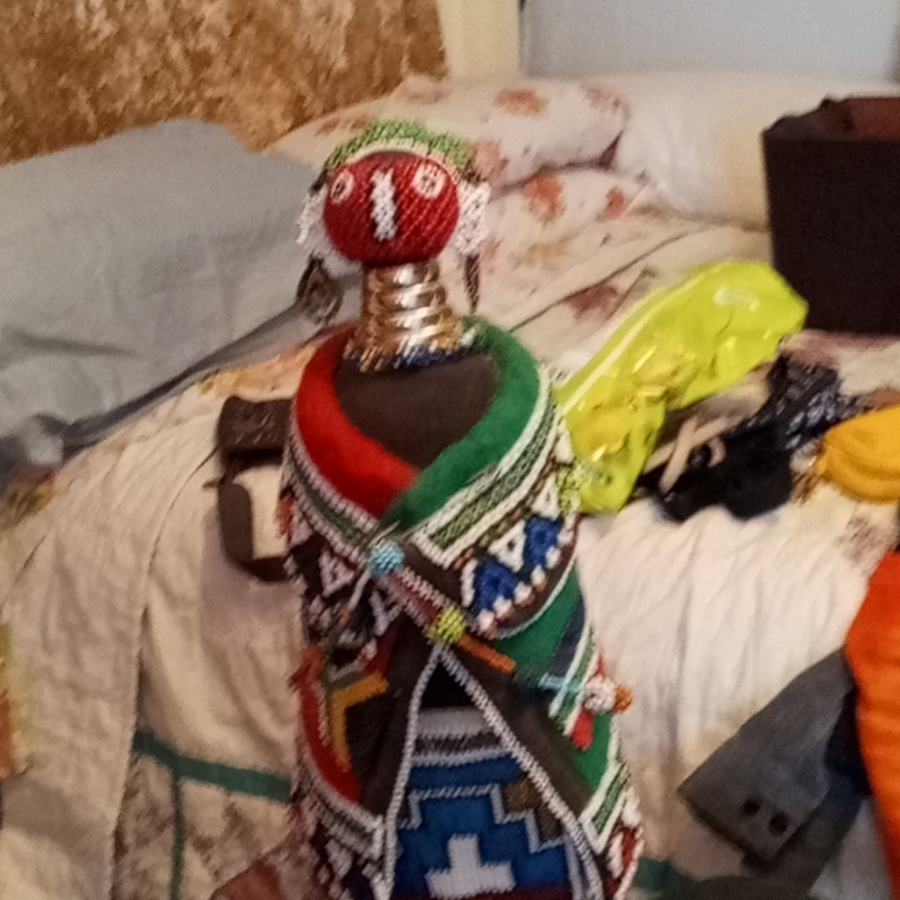 Hand made African doll with beaded clothes